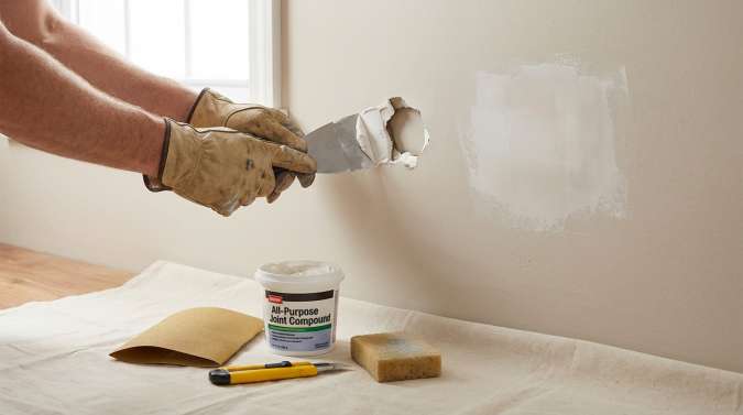 Guide complet pour reboucher un trou dans un mur