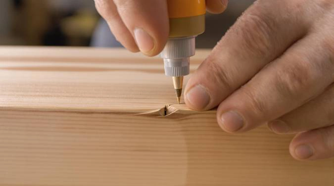 Comment masquer efficacement les défauts du bois